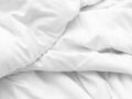 Pourquoi choisir une couette en plumes pour des nuits douces et confortables ?